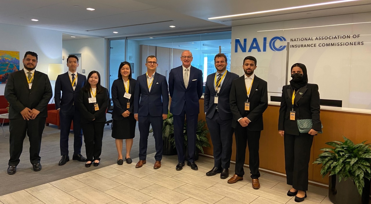 NAIC COO and Acting CEO Andy Beal with Fall 2023 International Fellows Program Participants